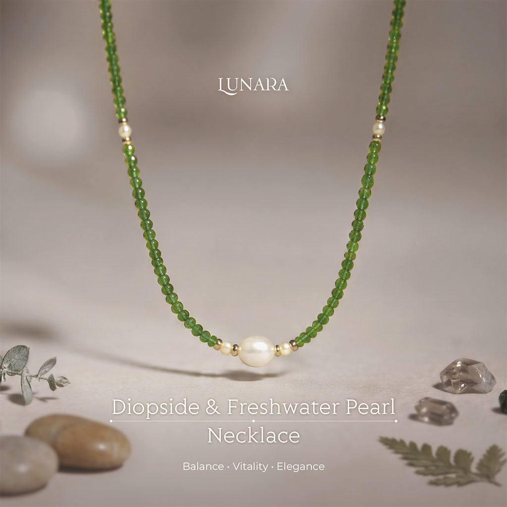 Diopside & Freshwater Pearl Energy Necklace displayed in a minimalist natural setting