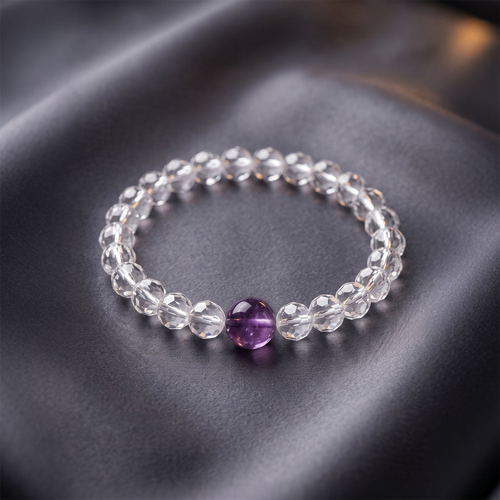 Close-up view of Uruguay Amethyst and Clear Quartz bracelet featuring faceted crystal beads and natural purple amethyst stone 